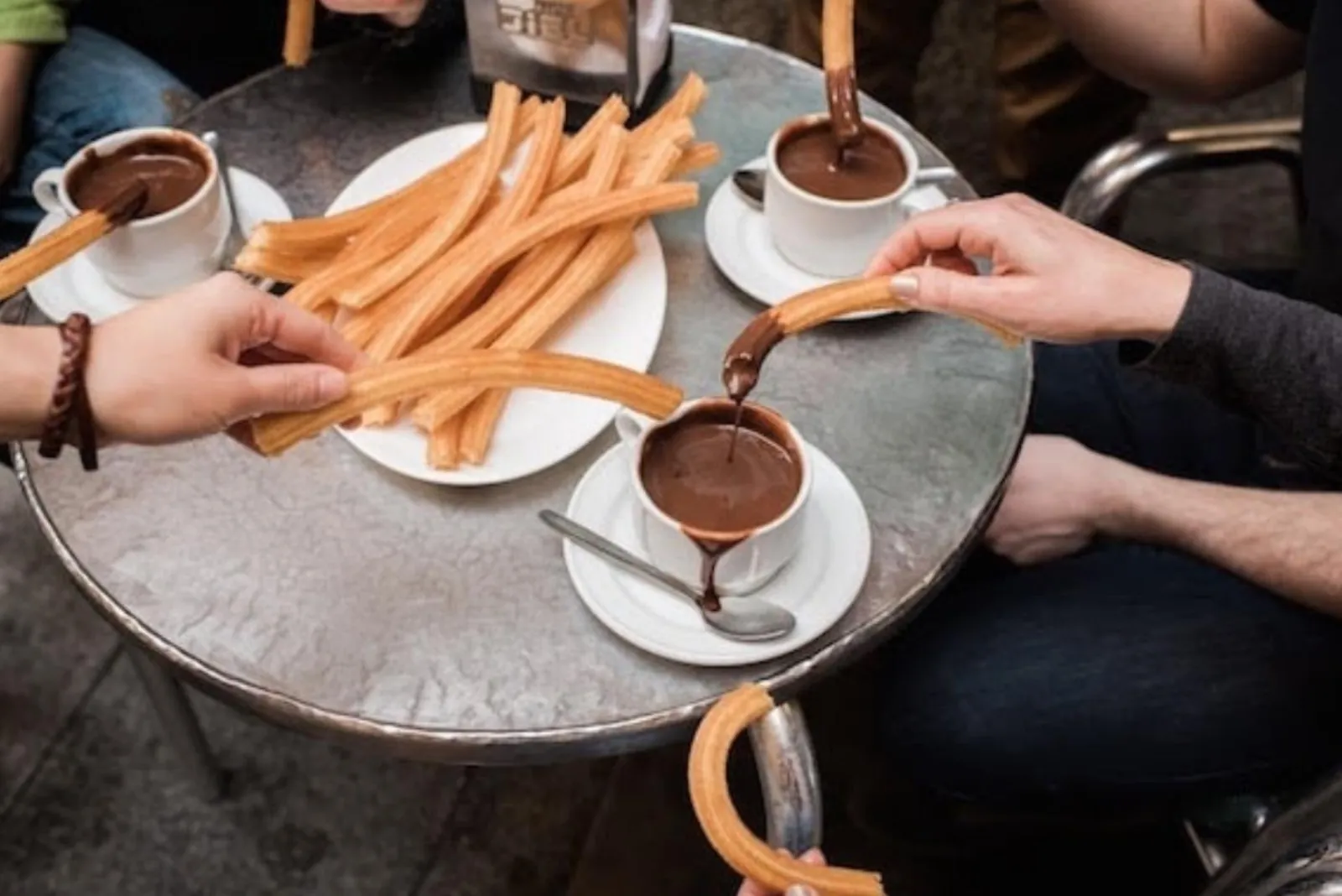 Churros and a cup of thick Madrid drinking chocolate