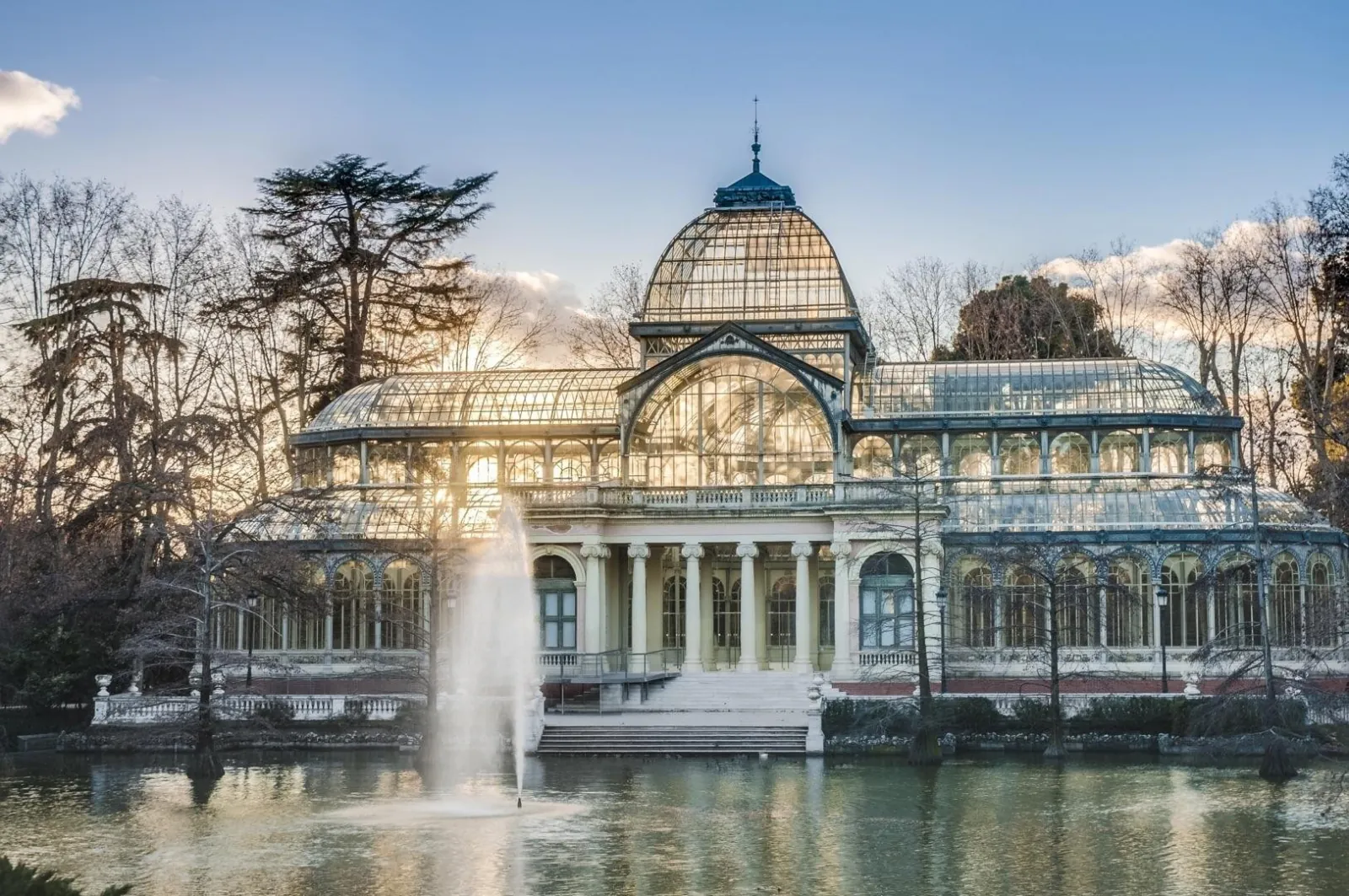 The Palacio de Cristal and the Retiro fountain in Madrid