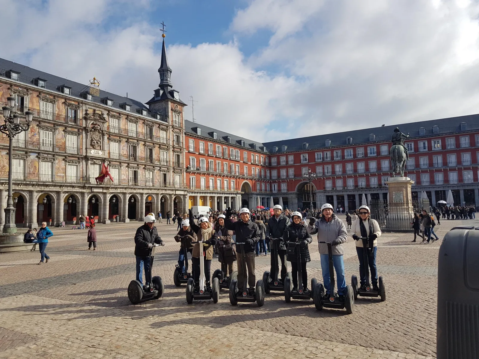 Segways drawn up in the arcaded square of Plaza Mayor