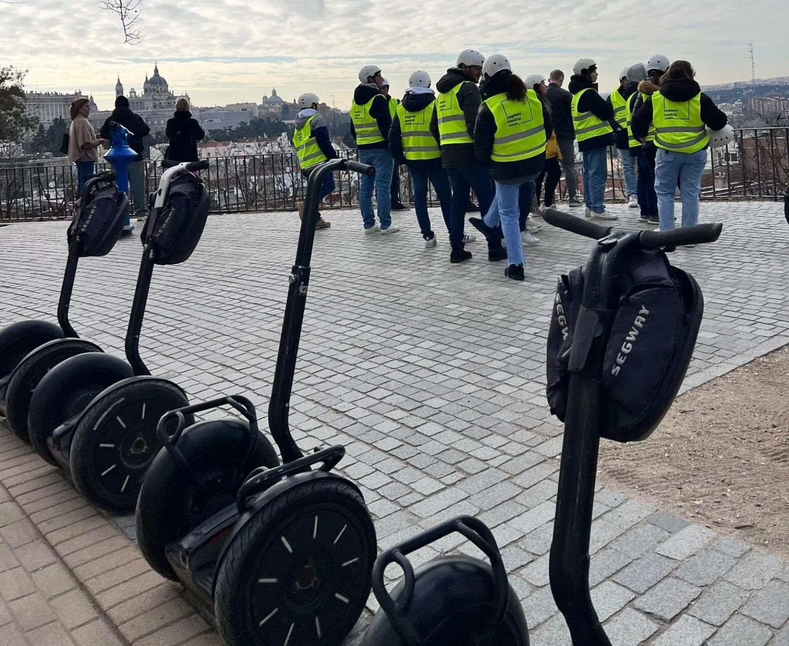 Segway group on the cobbles of a central Madrid square