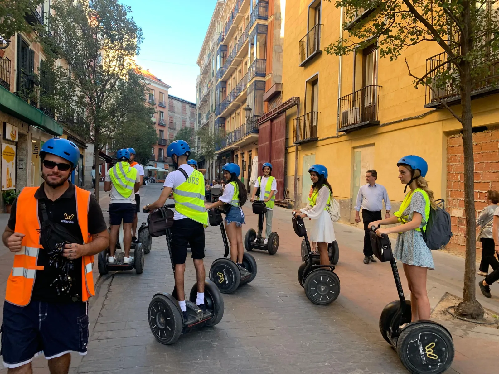 Segway group on a central Madrid street in the evening