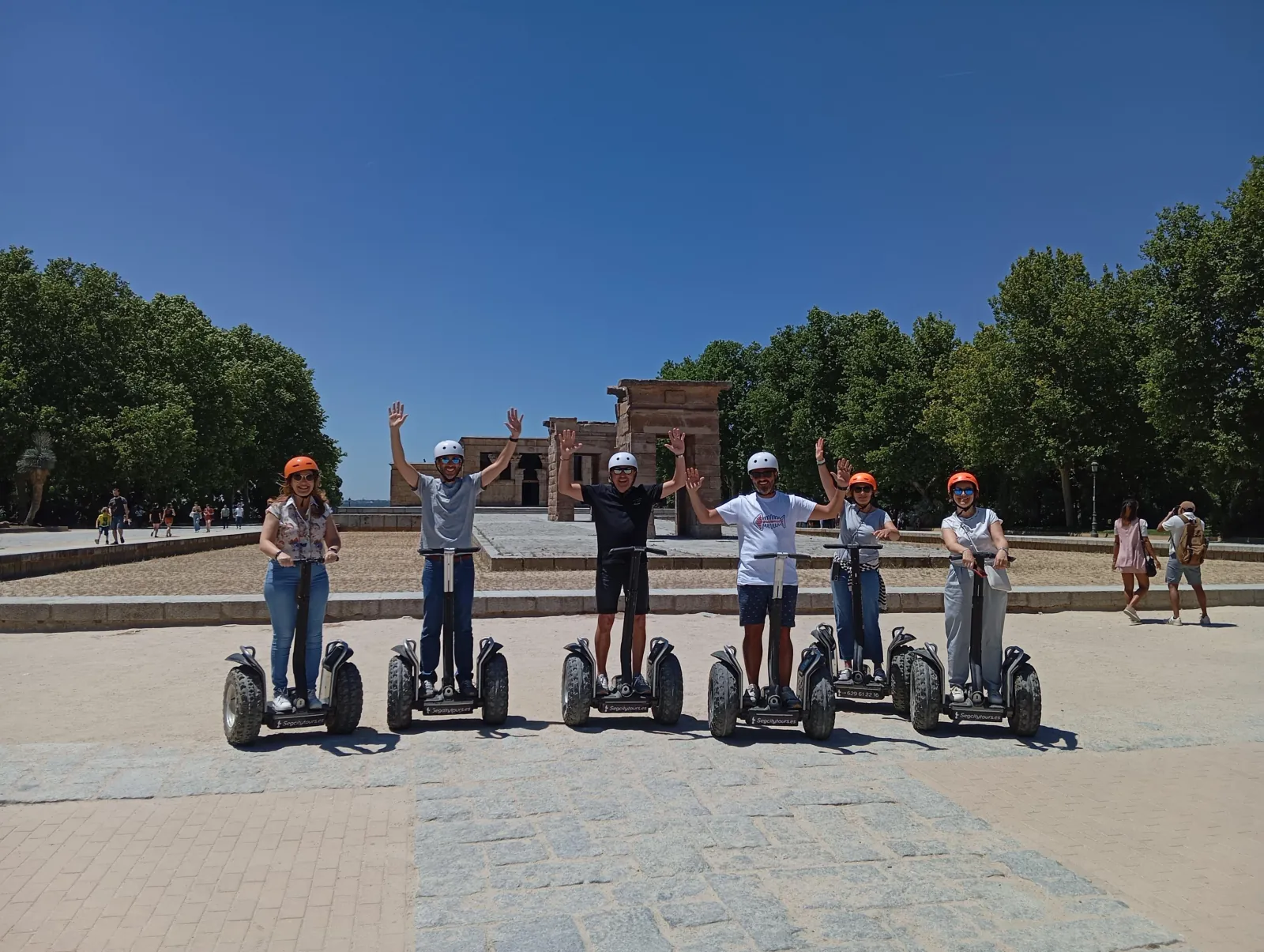 Riders lined up on Segways on the Royal Palace esplanade in Madrid