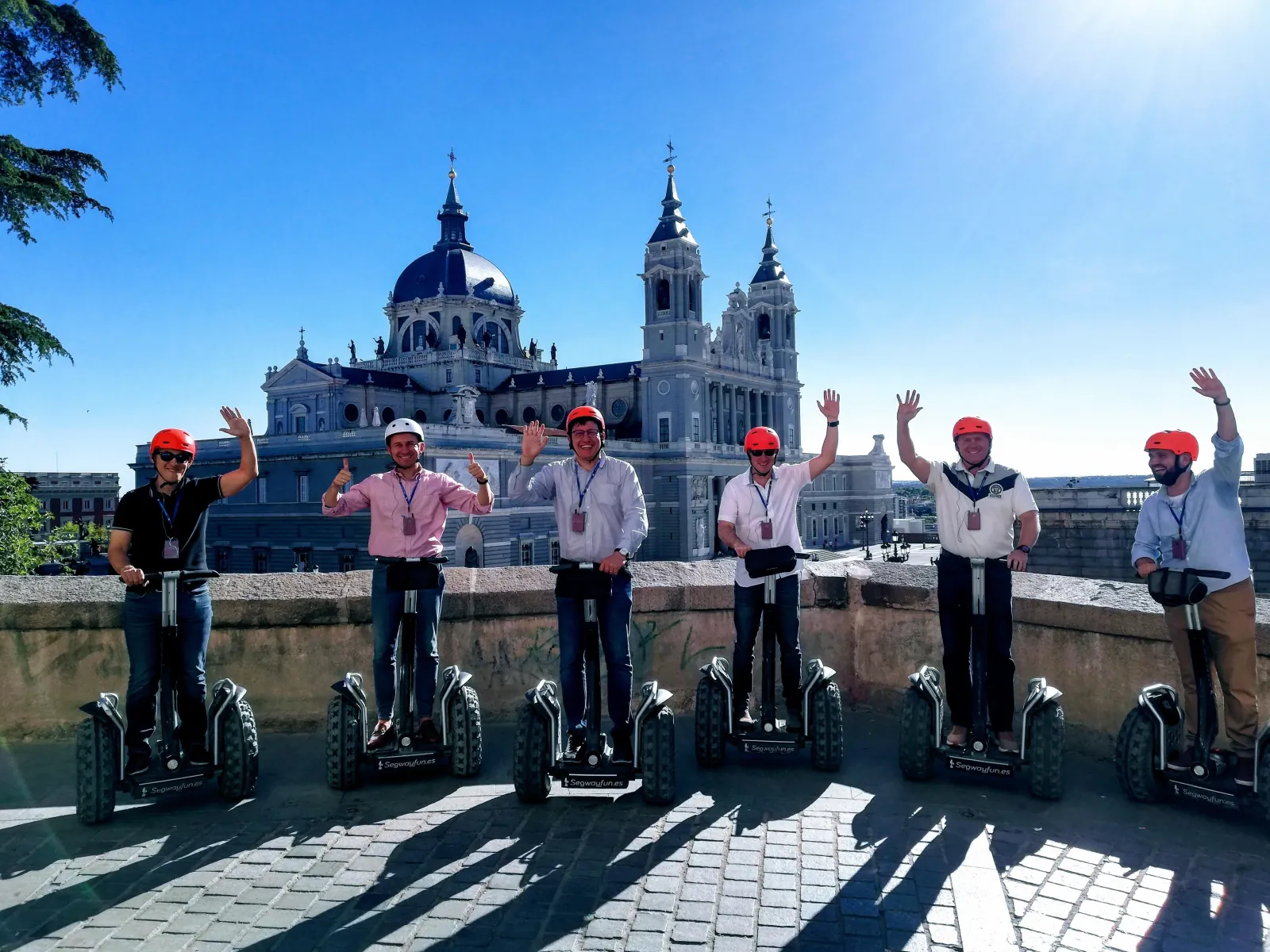 Segway group with the Almudena Cathedral behind them