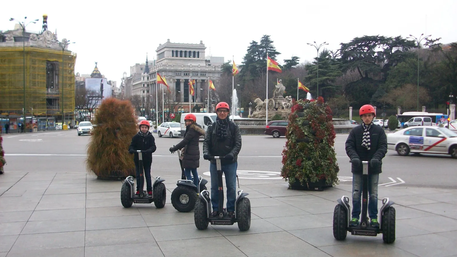 Private Segway group in a central Madrid square in winter