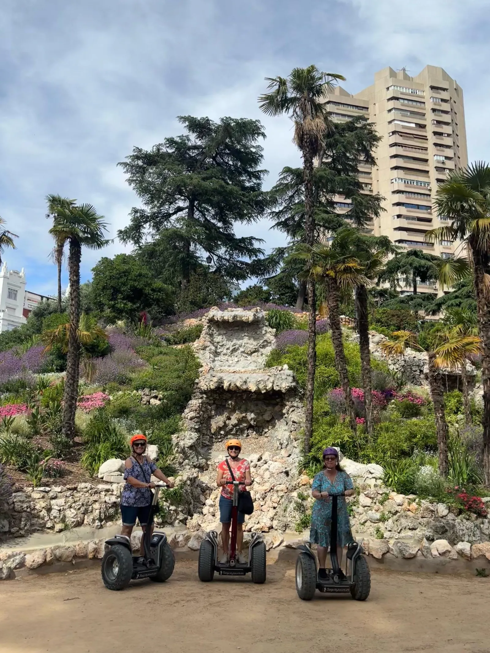 Segway riders among the rock-garden planting in Retiro Park