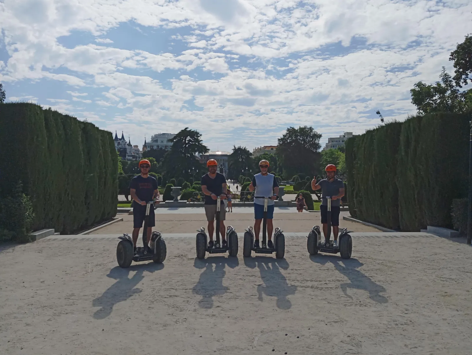 Private Segway group on a shaded avenue in Retiro Park
